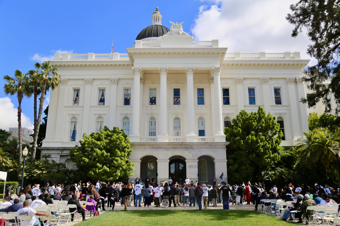 People power at the state capitol building in Sacramento before the pandemic.  The photo shows a large gathering in front of the capital in 2019.